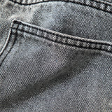 Asymmetric High-Waisted Straight-Leg Jeans in Light Wash Denim