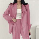 Elegant Tailored Blazer and Trouser Set with Modern Relaxed Fit