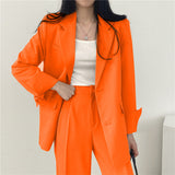 Elegant Tailored Blazer and Trouser Set with Modern Relaxed Fit