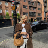Classic Long Trench Coat with Waist Belt and Double-Breasted Design