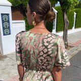Women's Wrap Animal Print Maxi Dress - Twist Front Detail and Fluted Sleeves