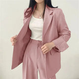 Elegant Tailored Blazer and Trouser Set with Modern Relaxed Fit